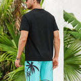Manfinity RSRT Conjunto para hombre de camiseta de cuello redondo de manga corta con estampado de plantas y pantalones cortos con cordon