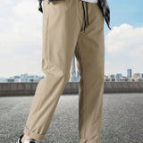 Pantalones rectos kaki sueltos y deportivos para uso casual al aire libre