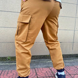 Manfinity Homme Pantalones cargo para hombre con cintura de cordon en colores contrastantes, con bolsillos y punos elasticos