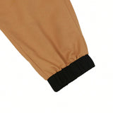 Manfinity Homme Pantalones cargo para hombre con cintura de cordon en colores contrastantes, con bolsillos y punos elasticos