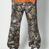 SUMWON Pantalon holgado con diseno de camuflaje completo con estampado frontal