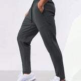 Pantalones deportivos casuales para hombres con cintura de cordon solida y bolsillos