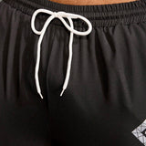 Pantalones deportivos ajustados tejidos con cordon y estampado de letras