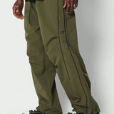 SUMWON Pantalones holgados y baggy de estilo paracaidas con dees con ribetes