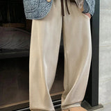 Homme Pantalones de lana de estilo americano vintage con remiendos