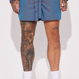 Pantalones cortos de nailon iridiscente tormentoso - Azul