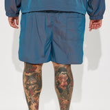 Pantalones cortos de nailon iridiscente tormentoso - Azul