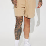 Me gusta como se ven los shorts de terry - color beige.