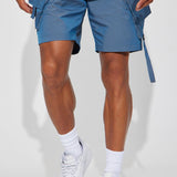 Pantalones cortos de carga iridiscentes y tormentosos - azul