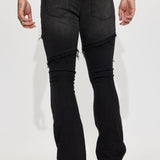 Atrapada en el ciclo de los jeans ajustados con bota de corte en capa - Negro.