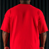 Me gusta cómo se ve la camiseta de manga corta oversized de terciopelo - roja.