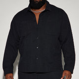 Camisa negra de manga larga con textura y botones Jordan
