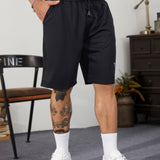 Manfinity Homme Hombres Shorts deportivos con estampado de letra con cordon